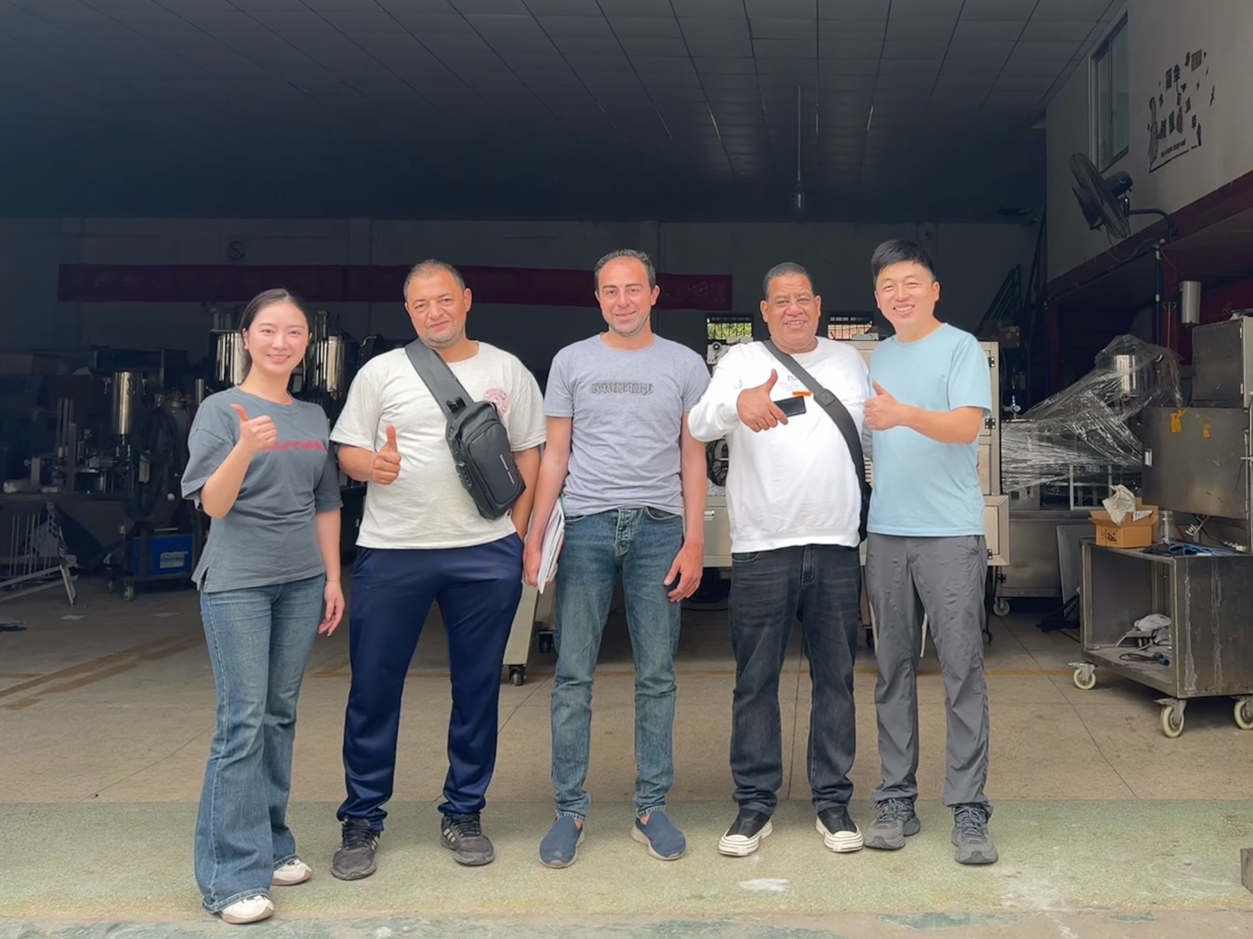 Customers and Langtai team at the production workshop